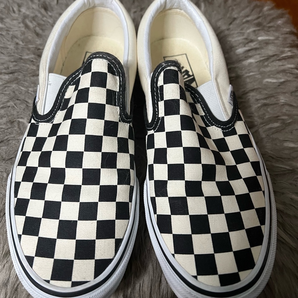 Vans Black and White Checkerboard Slip-On Sneakers